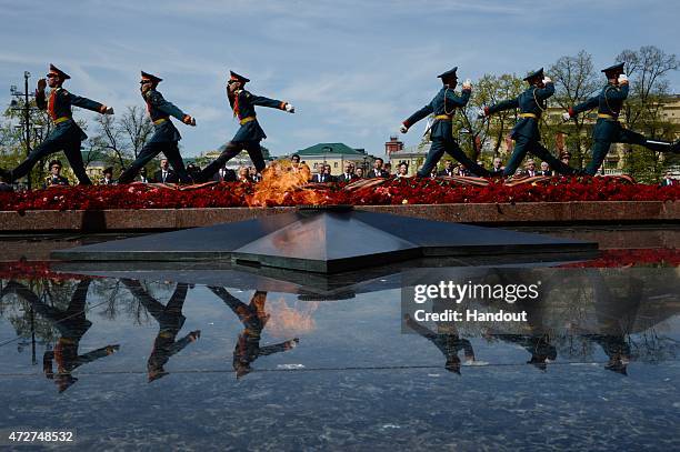 In this handout image supplied by Host photo agency / RIA Novosti, Russian President Vladimir Putin, heads of foreign delegations and honorary guests...