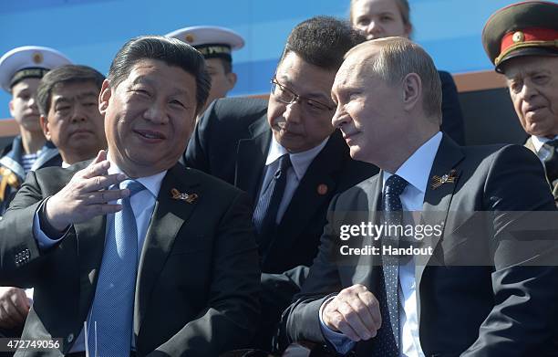 In this handout image supplied by Host photo agency / RIA Novosti, Russian President Vladimir Putin and President of the People's Republic of China...