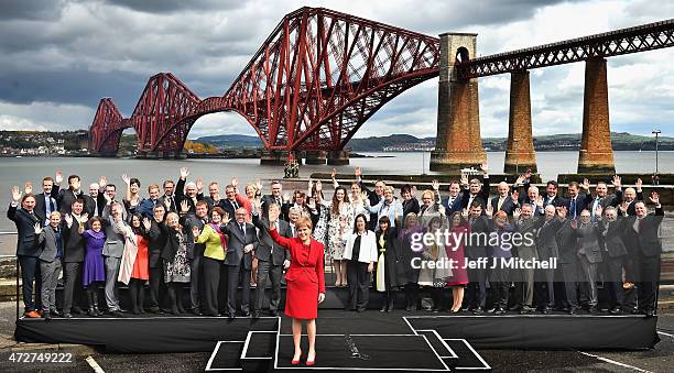 First Minister and leader of the SNP Nicola Sturgeon is joined by the newly elected members of parliament as they gather in front of the Forth Rail...