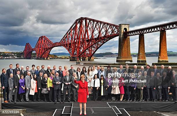 First Minister and leader of the SNP Nicola Sturgeon is joined by the newly elected members of parliament as they gather in front of the Forth Rail...