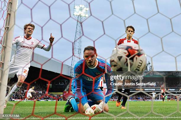 David Button of Brentford is unable to save Jelle Vossen of Middlesbrough scoring the first goal during the Sky Bet Championship Playoff Semi-Final...