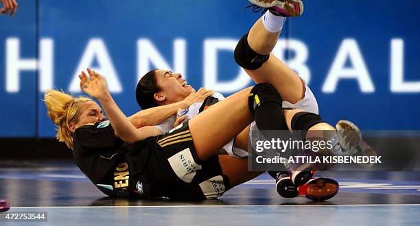 Norway's Gro Hammerseng-Edin fights for the ball with Russia's Asma El Ghaoui during the EHF Women's Champions League Final Four semi-final match of...