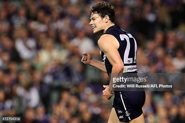 Lachie Neale of the Dockers celebrates after kicking a goal during the round six AFL match between the Fremantle Dockers and the Essendon Bombers at...