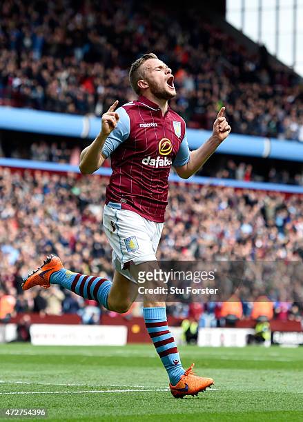 Tom Cleverley of Aston Villa celebrates scoring the opening goal during the Barclays Premier League match between Aston Villa and West Ham United at...