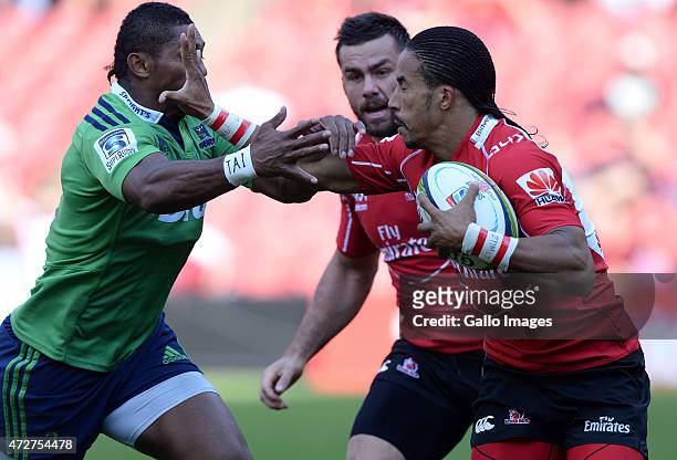 Courtnall Skosan of the Lions attacks during the Super Rugby match between Emirates Lions and Highlanders at Emirates Airline Park on May 09, 2015 in...