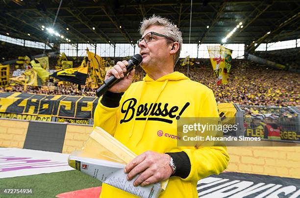 May 09: The stadium commentator Norbert Dickel of Borussia Dortmund prior to the Bundesliga match between Borussia Dortmund and Hertha BSC at Signal...