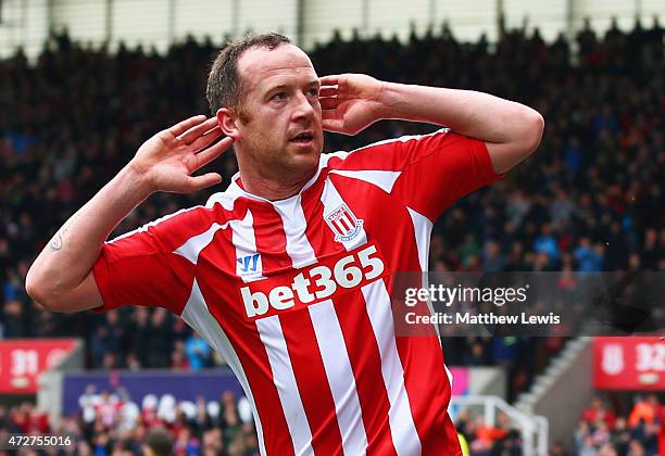 Charlie Adam of Stoke City celebrates scoring the opening goal during the Barclays Premier League match between Stoke City and Tottenham Hotspur at...