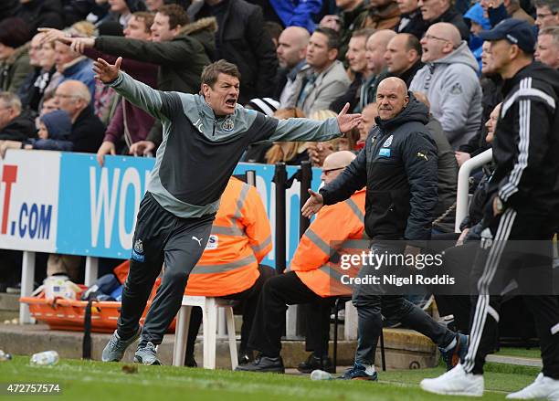 John Carver manager of Newcastle United reacts during the Barclays Premier League match between Newcastle United and West Bromwich Albion at St...