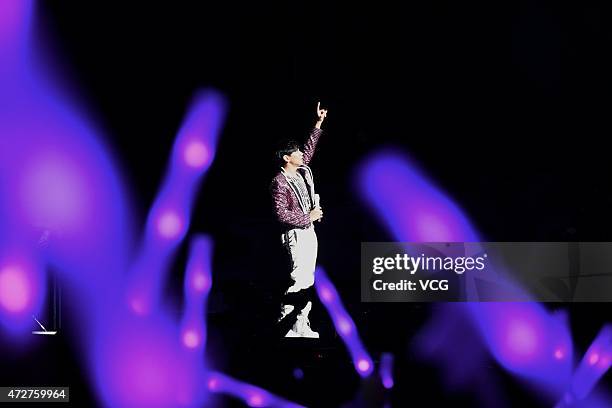 Singer JJ Lin sings on the stage during his personal concert at MasterCard Center on May 9, 2015 in Beijing, China.