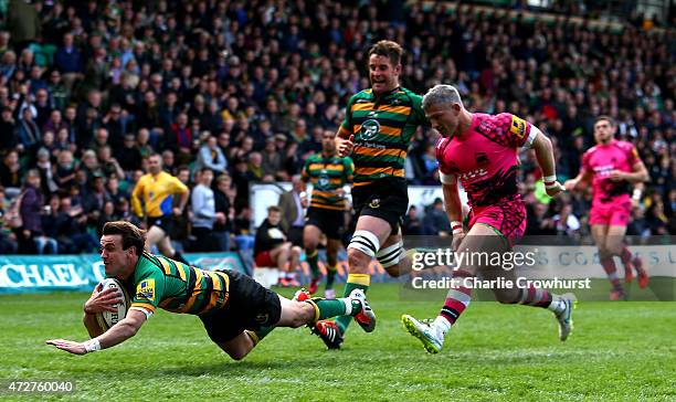 Lee Dickson of Northampton goes over to score a try during the Aviva Premiership match between Northampton Saints and London Welsh at Franklin's...