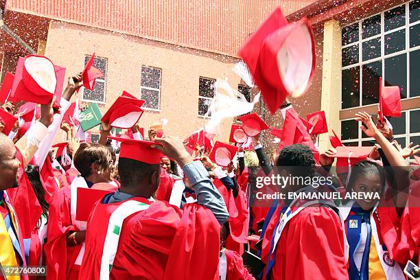 Class of 2015 graduating students of the American University of Nigeria in Yola, Adamawa state, celebrate after their commencement ceremony at the...