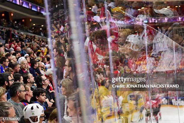 Spectators watch the group A preliminary round match Sweden vs Switzerland at the 2015 IIHF Ice Hockey World Championships on May 9, 2015 at the O2...