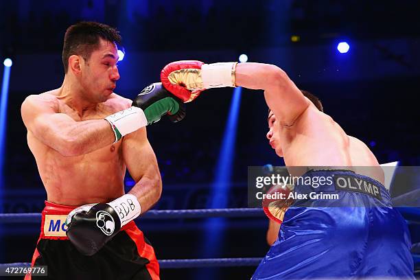 Felix Sturm of Germany and Fedor Chudinov of Russia exchange punches during their WBA super middle weight World Championship fight at Festhalle on...