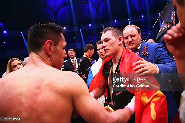 Felix Sturm of Germany congratulates winner Fedor Chudinov of Russia after their WBA super middle weight World Championship fight at Festhalle on May...