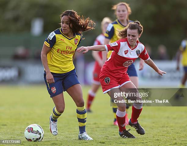 Alex Scott of Arsenal holds off pressure from Georgia Evans of Bristol during the WSL match between Bristol Academy Women and Arsenal Ladies FC at...