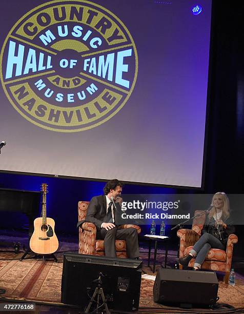 Moderator Peter Cooper and Singer/Songwriter Kim Carnes attend The Country Music Hall Of Fame And Museum Presents 'Conversation And Performance: Kim...