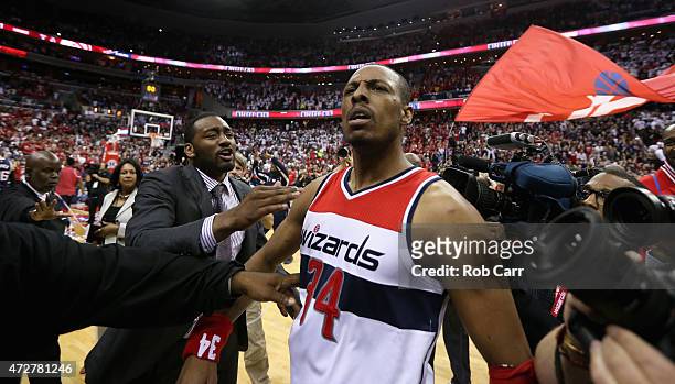 Paul Pierce of the Washington Wizards celebrates with John Wall after hitting the game winning shot to give the Wizards a 103-101 win over the...