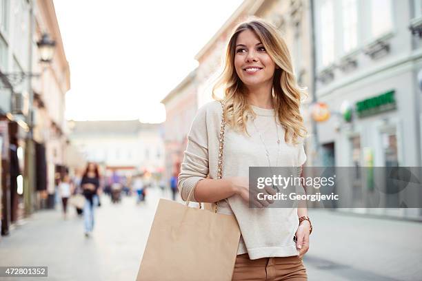 nice day for a shopping! - blonde hair woman city stock pictures, royalty-free photos & images