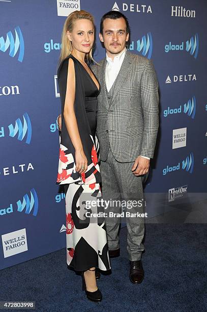 Athlete Aimee Mullins and actor Rupert Friend attend the VIP Red Carpet Suite hosted by Ketel One Vodka at the 26th Annual GLAAD Media Awards in New...