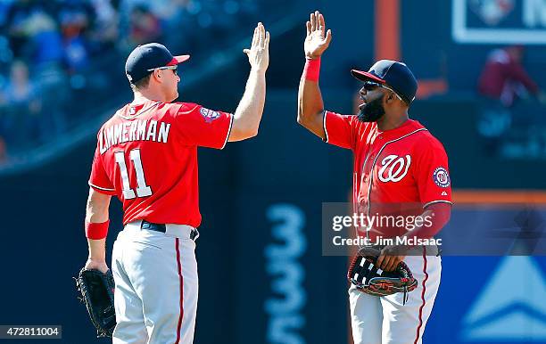 Denard Span of the Washington Nationals and Ryan Zimmerman of the Washington Nationals in action against the New York Mets at Citi Field on May 3,...