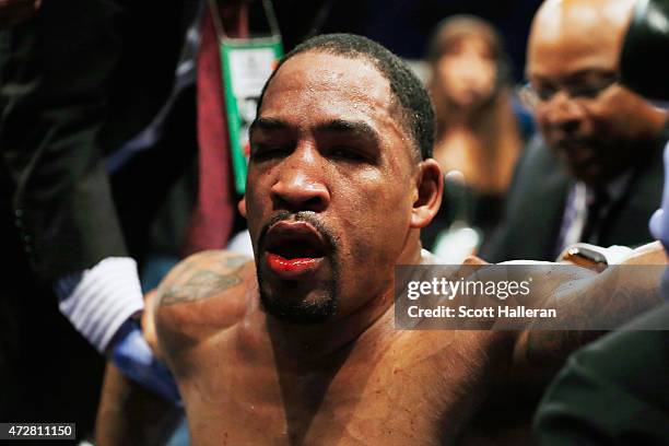 James Kirkland gets medical attention after being knocked down in the third round by Canelo Alvarez of Mexico during their super welterweight bout at...