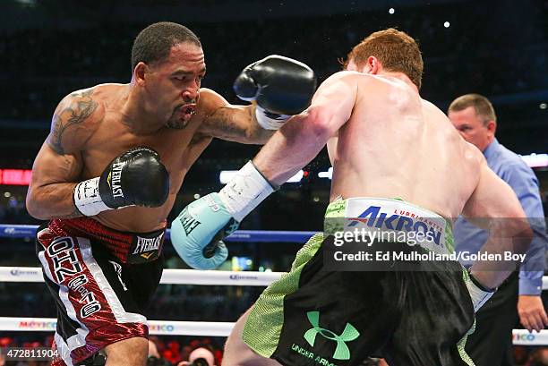 Saul "Canelo" Alvarez and James Kirkland during their 12 round super welterweight fight at Minute Maid Park on May 9, 2015 in Houston, Texas.