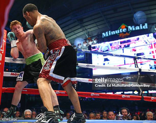 Saul "Canelo" Alvarez and James Kirkland during their 12 round super welterweight fight at Minute Maid Park on May 9, 2015 in Houston, Texas.