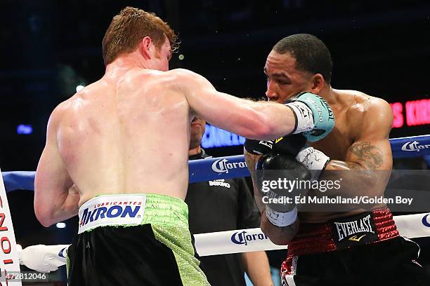 Saul "Canelo" Alvarez and James Kirkland during their 12 round super welterweight fight at Minute Maid Park on May 9, 2015 in Houston, Texas.