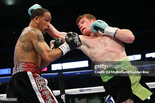 Saul "Canelo" Alvarez and James Kirkland during their 12 round super welterweight fight at Minute Maid Park on May 9, 2015 in Houston, Texas.