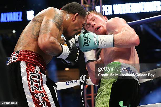 Saul "Canelo" Alvarez and James Kirkland during their 12 round super welterweight fight at Minute Maid Park on May 9, 2015 in Houston, Texas.