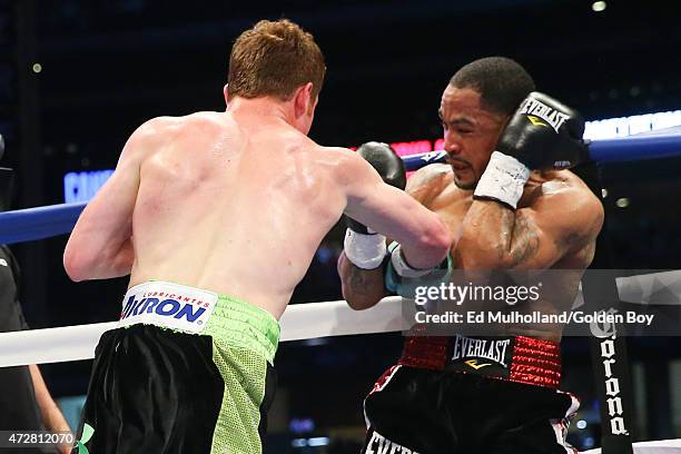 Saul "Canelo" Alvarez and James Kirkland during their 12 round super welterweight fight at Minute Maid Park on May 9, 2015 in Houston, Texas.