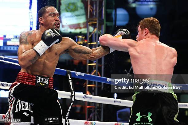 Saul "Canelo" Alvarez and James Kirkland during their 12 round super welterweight fight at Minute Maid Park on May 9, 2015 in Houston, Texas.