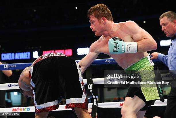 Saul "Canelo" Alvarez and James Kirkland during their 12 round super welterweight fight at Minute Maid Park on May 9, 2015 in Houston, Texas.