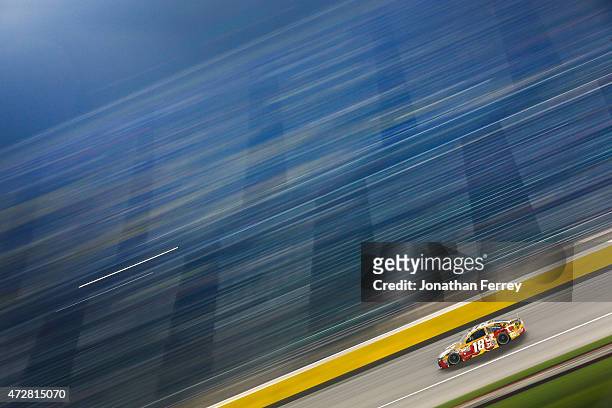 Erik Jones, driver of the M&M's Red Nose Day Toyota, races during the NASCAR Sprint Cup Series SpongeBob SquarePants 400 at Kansas Speedway on May 9,...