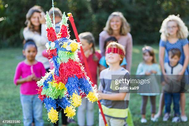 Pinata Injuries Kids Hitting Pinata Photos and Premium High Res Pictures - Getty Images