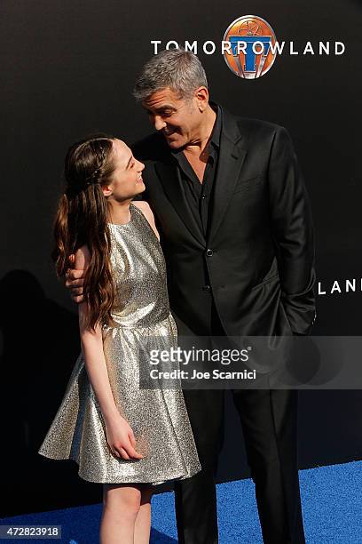Raffey Cassidy and George Clooney attend Disney's "Tomorrowland" - Los Angeles Premiere at AMC Downtown Disney 12 Theater on May 9, 2015 in Anaheim,...