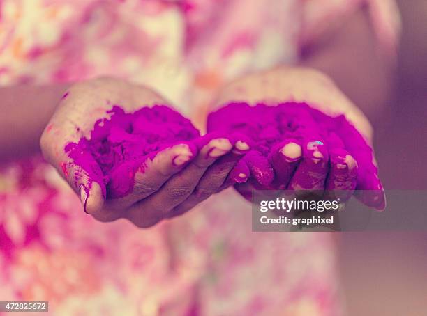 holi festival hands - holi hands stock pictures, royalty-free photos & images