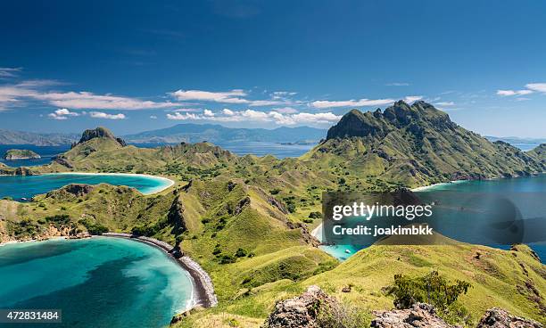 mountain range in komodo national park in indonesia - komodo stockfoto's en -beelden