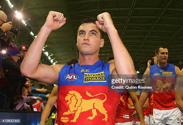 Tom Rockliff of the Lions celebrates winning the round six AFL match between the Carlton Blues and the Brisbane Lions at Etihad Stadium on May 10,...