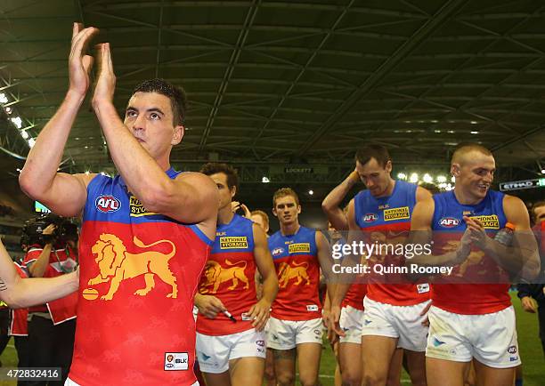 Tom Rockliff of the Lions celebrates winning the round six AFL match between the Carlton Blues and the Brisbane Lions at Etihad Stadium on May 10,...