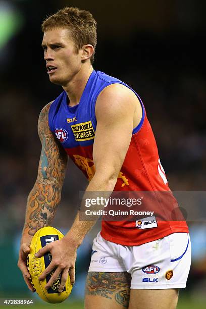 Dayne Beams of the Lions kicks during the round six AFL match between the Carlton Blues and the Brisbane Lions at Etihad Stadium on May 10, 2015 in...