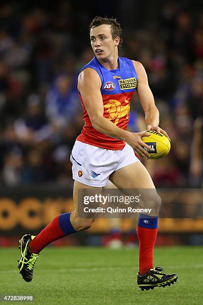 Lewis Taylor of the Lions looks to pass the ball during the round six AFL match between the Carlton Blues and the Brisbane Lions at Etihad Stadium on...