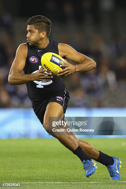 Clem Smith of the Blues runs with the ball during the round six AFL match between the Carlton Blues and the Brisbane Lions at Etihad Stadium on May...