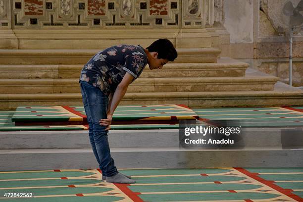 Man performs prayer inside the Catholic church of Santa Maria della Misericordia in Venice which has been provisionally transformed into a mosque for...