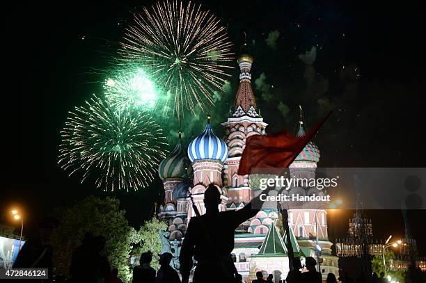 In this handout image supplied by Host photo agency / RIA Novosti, fireworks mark the 70th anniversary of Victory in the 1941-1945 Great Patriotic...