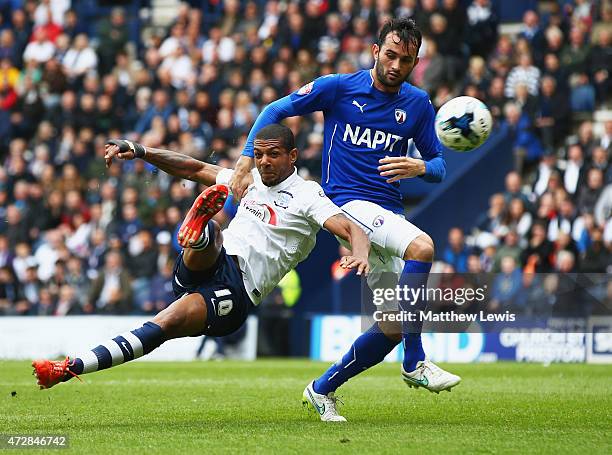 Jermaine Beckford of Preston North End holds off Sam Hird of Chesterfield to score their first goal during the Sky Bet League One Playoff Semi-Final...