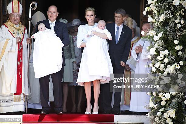 Prince Albert II of Monaco and his wife Princess Charlene leave the cathedral after the baptism of their twins Prince Jacques and Princess Gabriella...