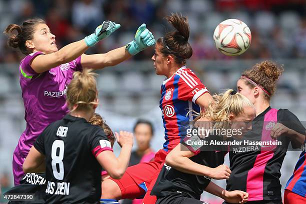Lisa Weiss, keeper of Essen saves the ball against Lena Lotzen of Muenchen during the Allianz Frauen-Bundesliga match between FC Bayern Muenchen and...
