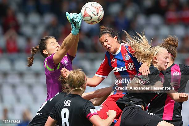 Lisa Weiss, keeper of Essen saves the ball against Lena Lotzen of Muenchen during the Allianz Frauen-Bundesliga match between FC Bayern Muenchen and...