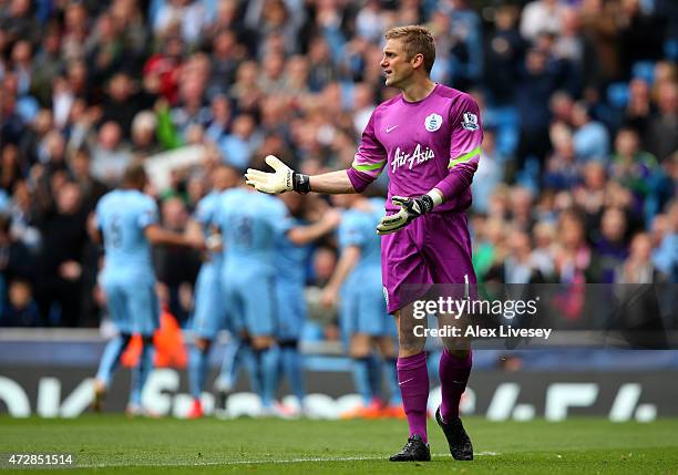 Dejected goalkeeper Robert Green of QPR reacts after conceding the opeing goal to Sergio Aguero of Manchester City during the Barclays Premier League...
